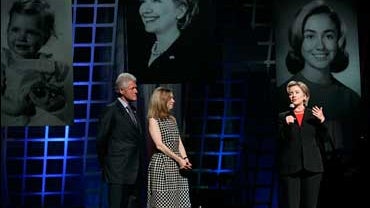 Democratic presidential hopeful Sen. Hillary Rodham Clinton, D-N.Y., speaks as her husband former President Bill Clinton, left, and daughter Chelsea, center, look on during a celebration for her 60th birthday Thursday, Oct. 25, 2007 in New York. (AP Photo 