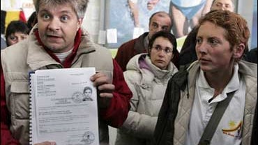Members of French Child Aid Group, L'Arche de Zoe 