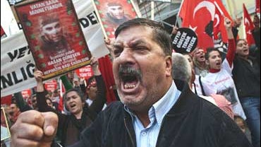 Turkish nationalists chant slogans during a protest against the outlawed PKK 