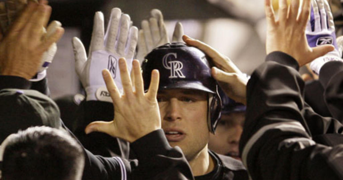 Colorado Rockies' Kazuo Matsui, right, gets a thumbs up from