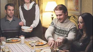 Paul Schneider, Emily Mortimer, Ryan Gosling and "Bianca," in "Lars and the Real Girl" (2007). 