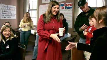 Cate Edwards, daughter of Democratic presidential hopeful former Sen. John Edwards, greets volunteers at the Edwards for President Office in Manchester, N.H., Saturday, Nov. 10, 2007. 
