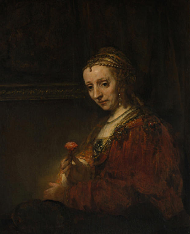 Woman with a Pink, early 1660s 