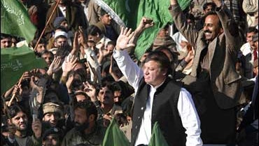 Opposition leader Nawaz Sharif greets a crowd of nearly 2,000 supporters in Barakau, Pakistan 