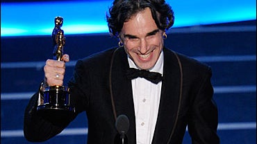 British actor Daniel Day-Lewis accepts the Oscar for best actor 
