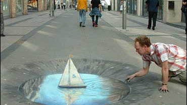 3-D sidewalk chalk drawing by Julian Beever 