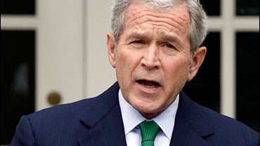President Bush speaks during a news conference in the Rose Garden of the White House 