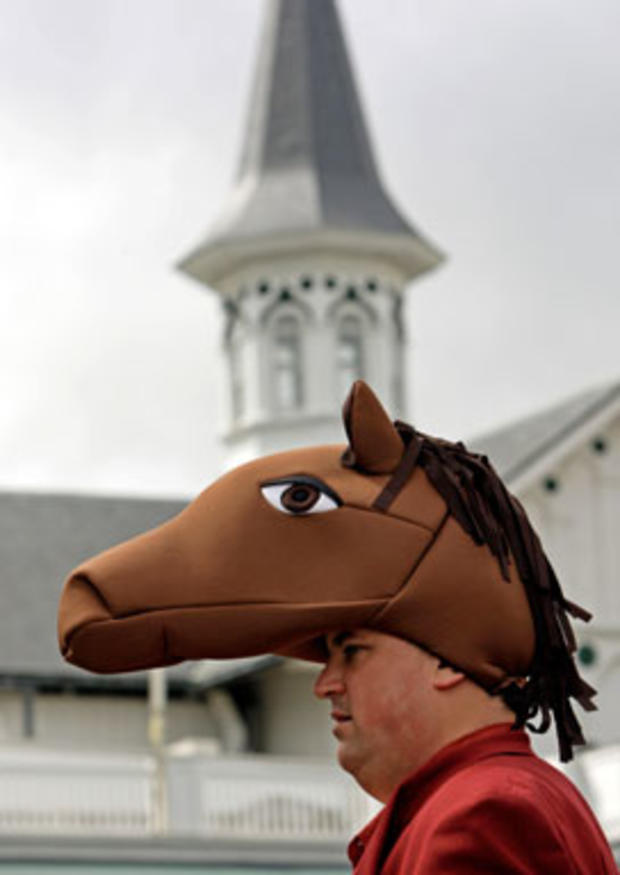 Matt Travers walks through the paddock with his Derby headwear before the 134th Kentucky Derby Saturday, May 3, 2008, at Churchill Downs in Louisville, Ky. 