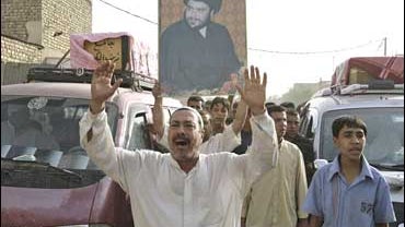 Relatives march during the funeral of Sattar Khalaf and Mohammed Jassim, who were killed in an airstrike in the Shiite stronghold of Sadr City 