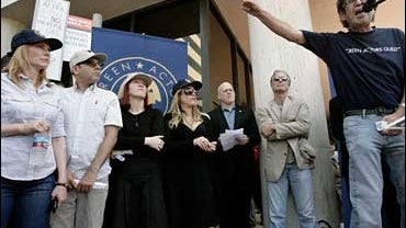 Alan Rosenberg, right, president of the Screen Actors Guild, addresses the union and its supporters, including from left, actors Marg Helgenberger, Willie Garson, Kate Flannery, Lisa Ann Walter, Doug Allen, national exec. dir. and chief negotiator for SAG 