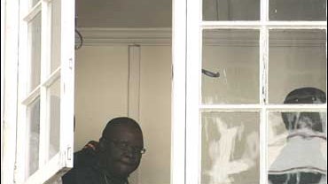 Zimbabwean Tendai Biti, Secretary General of the main opposition party, upon his arrival at the High Court in Harare; he is charged with treason 