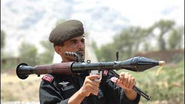 A Pakistani paramilitary solider stands guard in Pakistan's tribal area of Khyber near Peshawar 