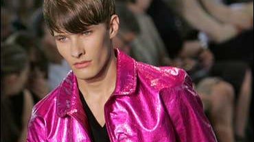 A model wears a creation by fashion house Christian Dior during the presentation of their Men's Fashion Spring-Summer 2009 collection in Paris, Sunday, June 29, 2008. 