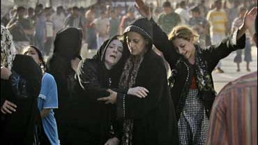 iraq civilians mourning funeral suicide bomber 