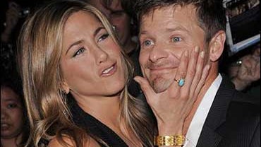 Actress Jennifer Aniston and actor Steve Zahn attend the premiere of "Management" during the Toronto International Film Festival on Sunday, Sept. 7, 2008 in Toronto. (AP Photo/Evan Agostini) 