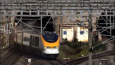 A Eurostar train coming from London leaves the Northbound Channel tunnel to England in Calais, France 
