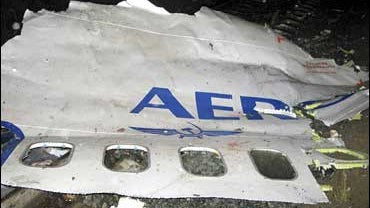 A piece of the fuselage of an Aeroflot Boeing-737-500 lies at the crash site on the outskirts of the Ural Mountains city of Perm 
