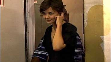 In this still image from video, Katie Holmes leaves the Gerald Schoenfeld Theatre after her Broadway debut in "All My Sons" on Thursday, Sept. 18, 2008 in New York. 