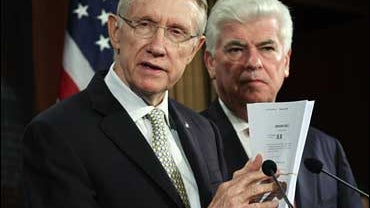 Senate Majority Leader Harry Reid, D-Nev., left, and Sen. Christopher Dodd, D-Conn. 