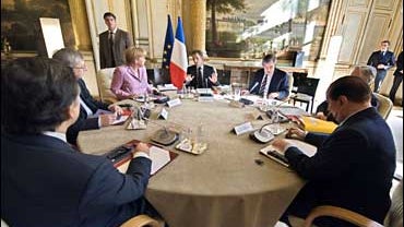 From left, European Commission President Jose Manuel Barroso, Luxembourg's Prime Minister Jean-Claude Junker, German Chancellor Angela Merkel, French President Nicolas Sarkozy, British Prime Minister Gordon Brown, European Central Bank President Jean Clau 