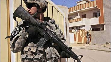 A U.S. Army soldier from Ironhawk Troop, 3rd Squadron, 3rd Armored Cavalry Regiment, patrols in Mosul 
