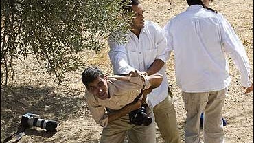 Palestinian Photographer Attacked 