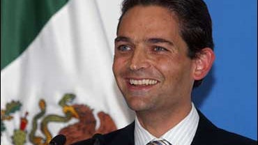 Mexico's new Interior Secretary Juan Camilo Mourino smiles during his first news conference after being appointed earlier in the day in Mexico City, in this Jan. 16, 2008 file photo. He died in a firey plane crash on Nov. 4, 2008. 
