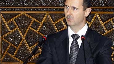Syrian President Bashar Assad addresses the opening session of the transit Arab Parliamentarian Union in Damascus 
