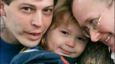 Heath Campbell, left, with his wife Deborah and son Adolph Hitler, 3 