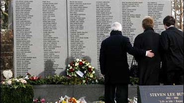 Members of the congregation attend a wreath laying ceremony at the Garden of Remembrance in Tundergarth to mark the 20th anniversary of the Lockerbie air disaster. 