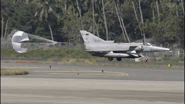 A Sri Lankan Air Force fighter jet lands after carrying out an air raid against Tamil Tiger rebels in Colombo, Sri Lanka 