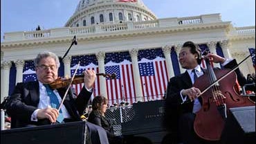 Violinist Itzahk Perlman, left, and cellist Yo-Yo Ma 