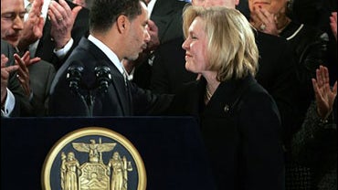 New York Gov. David Paterson, left, turns to Rep. Kirsten Gillibrand, D-N.Y., at a news conference in Albany, N.Y., Friday, Jan. 23, 2009. 