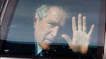 Bush waves from car 
