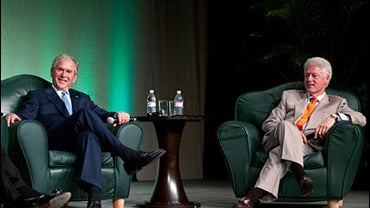 Former Presidents George W. Bush and Bill Clinton together at a symposium on global affairs in Toronto Friday, May 29, 2009. 
