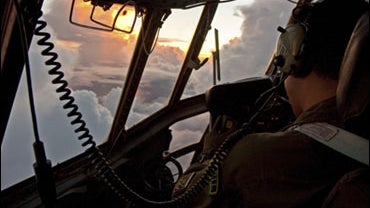In this photo released by Brazil's Air Force, a pilot flies during search operations for Air France's flight 447 that went missing over the Atlantic Ocean near Brazil, Wednesday, June 3, 2009. 