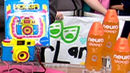 Dany Levy, the founder and editorial director of DailyCandy.com, appeared on <b><i>The Early Show</b></i> with these fashionable finds: the LOMO Holga kit to make film photographs, left, and Neuro Sleep, a drink that claims to induce sleep. 