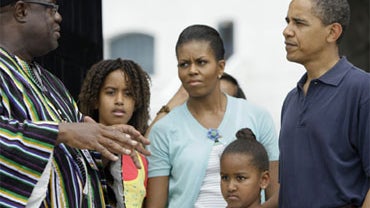 President Barack Obama, right, first lady Michelle Obama and their daughters Malia and Sasha are seen on a tour of the Cape Coast Castle in Cape Coast, Ghana, Saturday, July 11, 2009. 