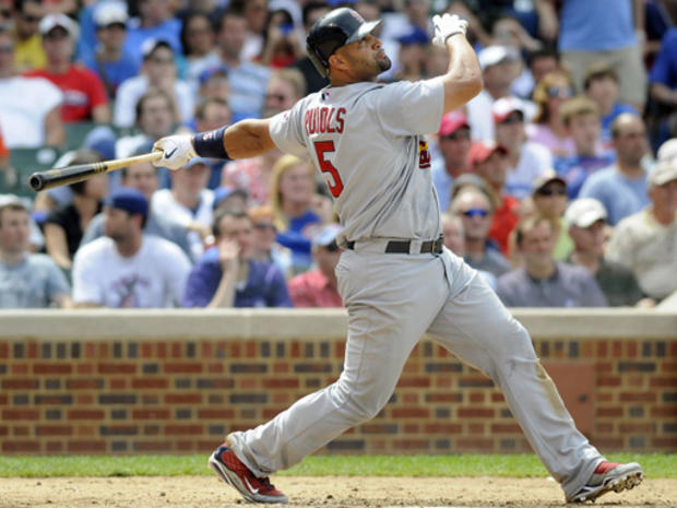 Albert Pujols hits a solo home run during 