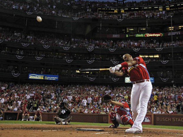 Albert Pujols hits a home run during the first round of the MLB baseball Home Run Derby 