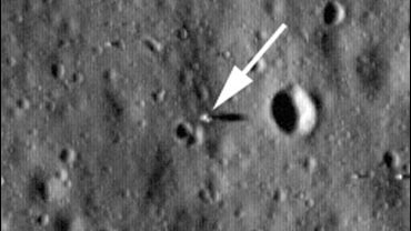 NASA released Friday the first pictures of the Apollo moon landing sites taken by the space agency's Lunar Reconnaissance Orbiter. The arrow points out the Eagle lunar module used by Neil Armstrong and Buzz Aldrin for the Apollo 11 mission as long shadows 