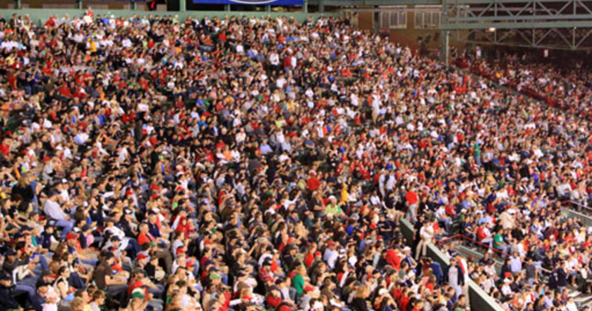 Red Sox fans do the Wally Wave at Fenway 