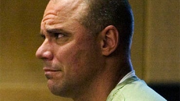 Former Major League baseball player Jim Leyritz listens to a statement from the prosecutor during a hearing to determine whether Leyritz should await his upcoming DUI manslaughter trial in jail, in Fort Lauderdale, Fla., Thursday July 9, 2009. Leyritz's b 