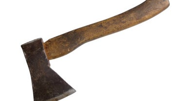Small, old rusty hatchet 