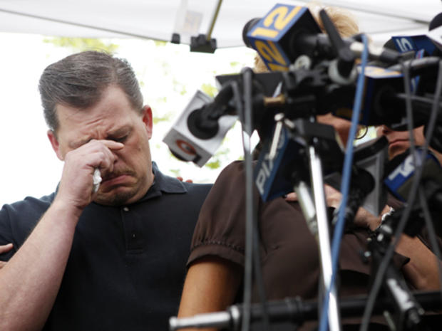 Daniel Schuler cries while his sister-in-law Jay Schuler speaks at a press conference in Garden City, N.Y., Thursday, Aug. 6, 2009. Schuler's wife Diane was drunk and high on marijuana when she drove the wrong way for almost two miles on a highway before  