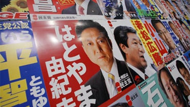 A poster of Yukio Hatoyama, leader of Japan's main opposition Democratic Party of Japan, is seen among other candidates' at the party's election center before ballot counting in Tokyo, Japan, Sunday, Aug. 30, 2009. 