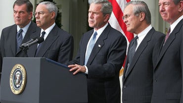 President Bush, center, holds a press conference in the Rose Garden with members of his Cabinet from left to right, Secretary of Homeland Security Tom Ridge, Secretary of State Colin Powell, Secretary of Defense Donald H. Rumsfeld, and Attorney General Jo 
