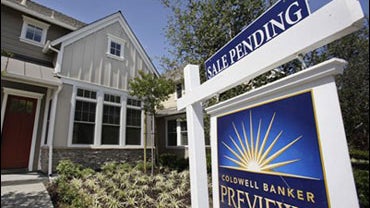 In this July 24, 2009, file photo, a pending home sale in Palo Alto, Calif., is shown. The National Association of Realtors said Tuesday, Sept. 1, 2009, pending U.S. home sales rose more than expected in July to the highest level in more than two years as 