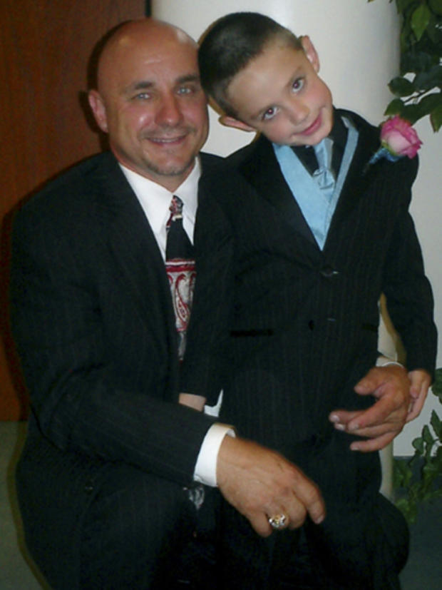 In this Aug. 2007 photo provided by Michael Chekevdia, Richard Chekevdia, right, poses with his father Michael Chekevdia at a wedding in West Frankfort, Ill. Authorities say the boy, allegedly abducted in a custody dispute two years ago, has been found al 