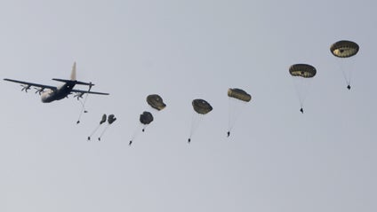 British, American and Dutch parachutists drifted out of blue skies over Ginkel Heath in Ede, Netherlands, some 30 kilometers west of Arnhem, Saturday Sept. 19, 2009. 